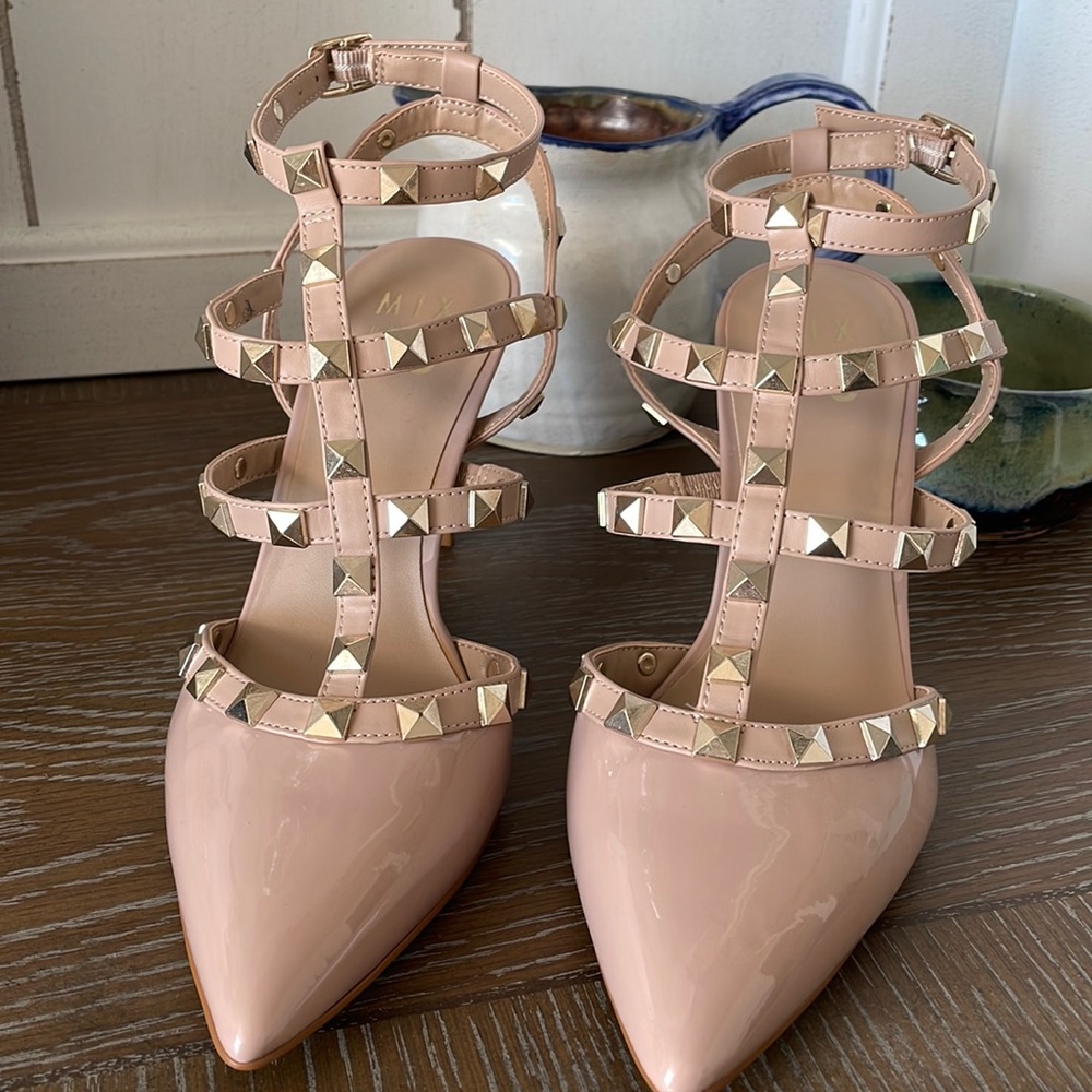 Brand new studded heel